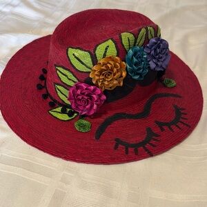 Artist signed Red Frida hat 7”x 8” inside dimensions.